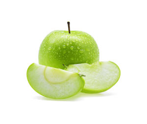 Close-up of wet granny smith apples against white background