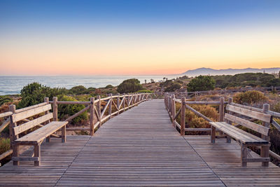 View of bridge over sea against clear sky