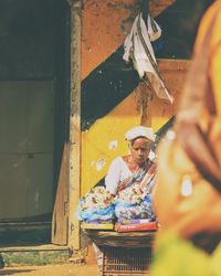 Woman selling floral garland