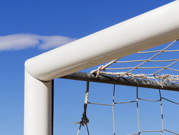 Low angle view of metallic structure against sky