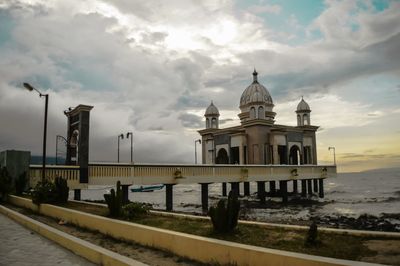 View of building against cloudy sky