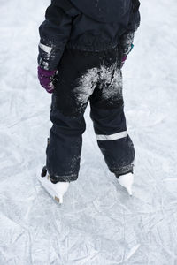 Child ice skating, low section, sweden