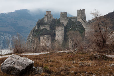 Stone wall with mountain in background