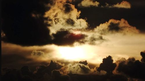 Low angle view of dramatic sky during sunset