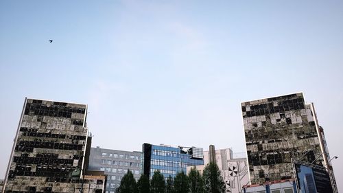 Low angle view of buildings against clear sky