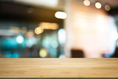 Close-up of illuminated lights on table