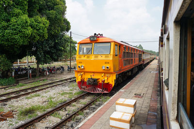 Train on railroad track against sky