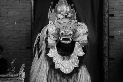 Close-up of statue against wall