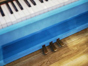 High angle view of piano keys on table