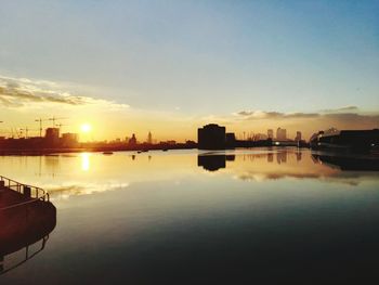 Scenic view of sunset over river