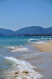 Scenic view of sea against clear sky