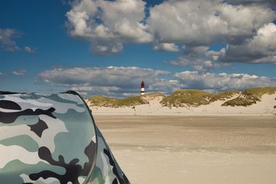 Scenic view of beach against sky