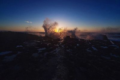 Scenic view of sea at sunset