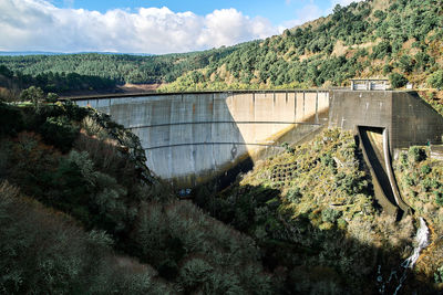 Albarellos, orense spain january 22 2021, walk on the wall of the albarellos reservoir in orense