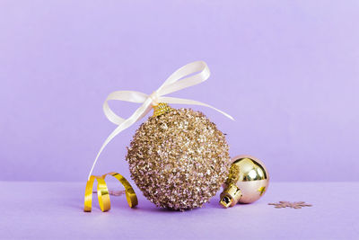 Close-up of christmas decorations on white background