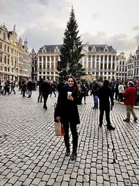 People walking on street in city