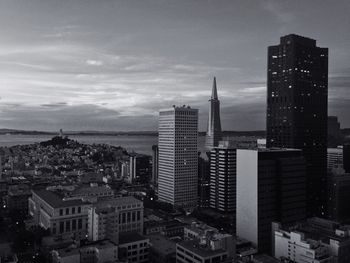 Buildings in city against sky