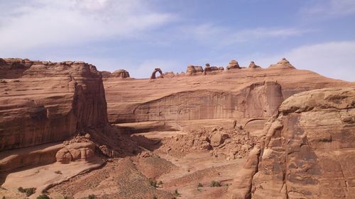 Rock and arches formation against blue sky