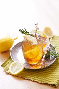 Close-up of orange juice on table