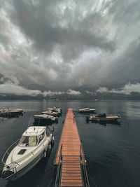 Boats moored at harbor