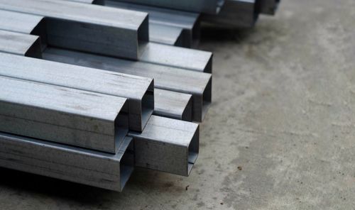 High angle view of piano keys on wood