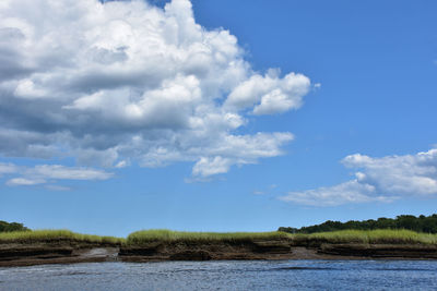 Beautiful river landscape with a marsh and tidal river.