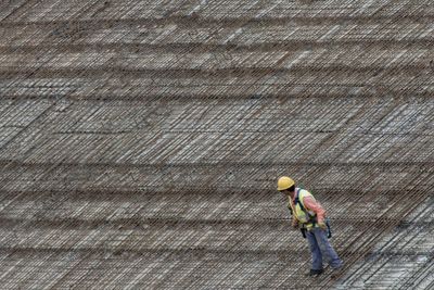 High angle view of man working at construction site