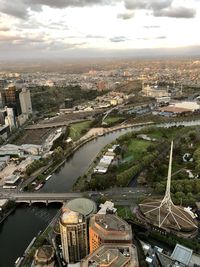High angle view of river amidst buildings in city