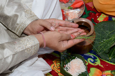 High angle view of woman holding hands