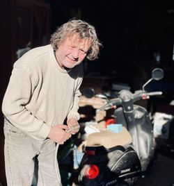 Man looking at camera at night