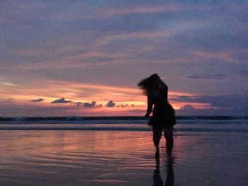 Scenic view of sea at sunset