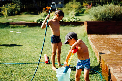 Boys playing in yard