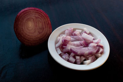 High angle view of chopped vegetables in bowl on table