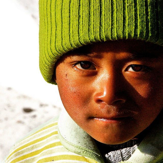 portrait, looking at camera, headshot, person, close-up, front view, human face, lifestyles, young adult, focus on foreground, head and shoulders, smiling, leisure activity, young men, childhood, serious, happiness