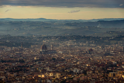 High angle view of city at sunset