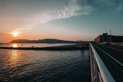 Scenic view of sea against sky at sunset