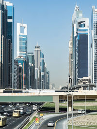 Modern buildings in city against sky