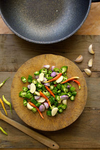 High angle view of chopped vegetables on cutting board