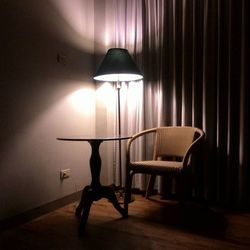 Empty illuminated lamp at home