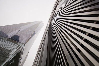 Low angle view of skyscrapers against sky