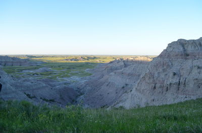 Scenic view of land against clear sky