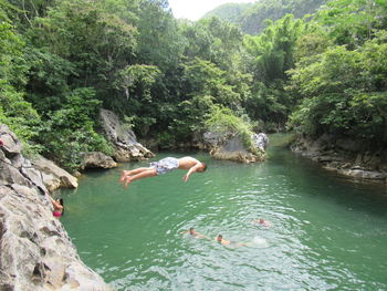 High angle view of man swimming in river