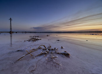 Sunset on the pink lagoon of the salt flats of torrevieja, spain