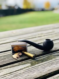 Close-up of cigarette on table