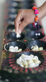 Close-up of hand holding ice cream