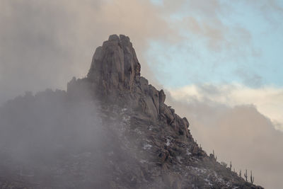 Scenic view of rocky mountains against sky