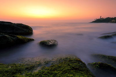 Scenic view of sea at sunset