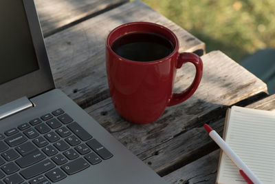 High angle view of coffee cup on table