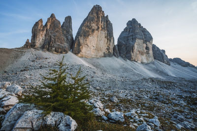 Rocks in mountains against sky