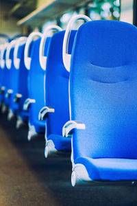 Close-up of empty seats in bus